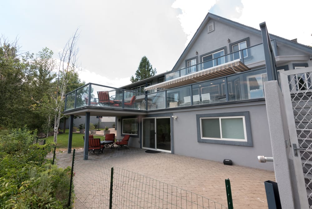 Back of the house with balconies and patio